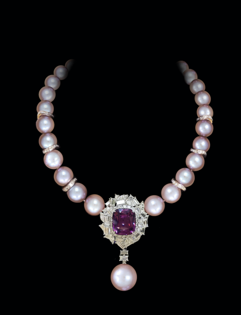 Stunning pink spinel and diamond pendant suspended from a natural coloured pink pearl strand accented with diamond rondelles on 18 karat white gold