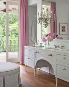 The architect designed the vanity, which looks like a vintage piece of furniture. A project from Suzanne Kasler: Sophisticated Simplicity. Photo by Peter Vitale.