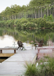 Docks are iconic in the Low Country, and the ultimate places to sit, have a drink, and watch the sun rise and set.A project from Suzanne Kasler: Sophisticated Simplicity. Photo by Erica George Dines.