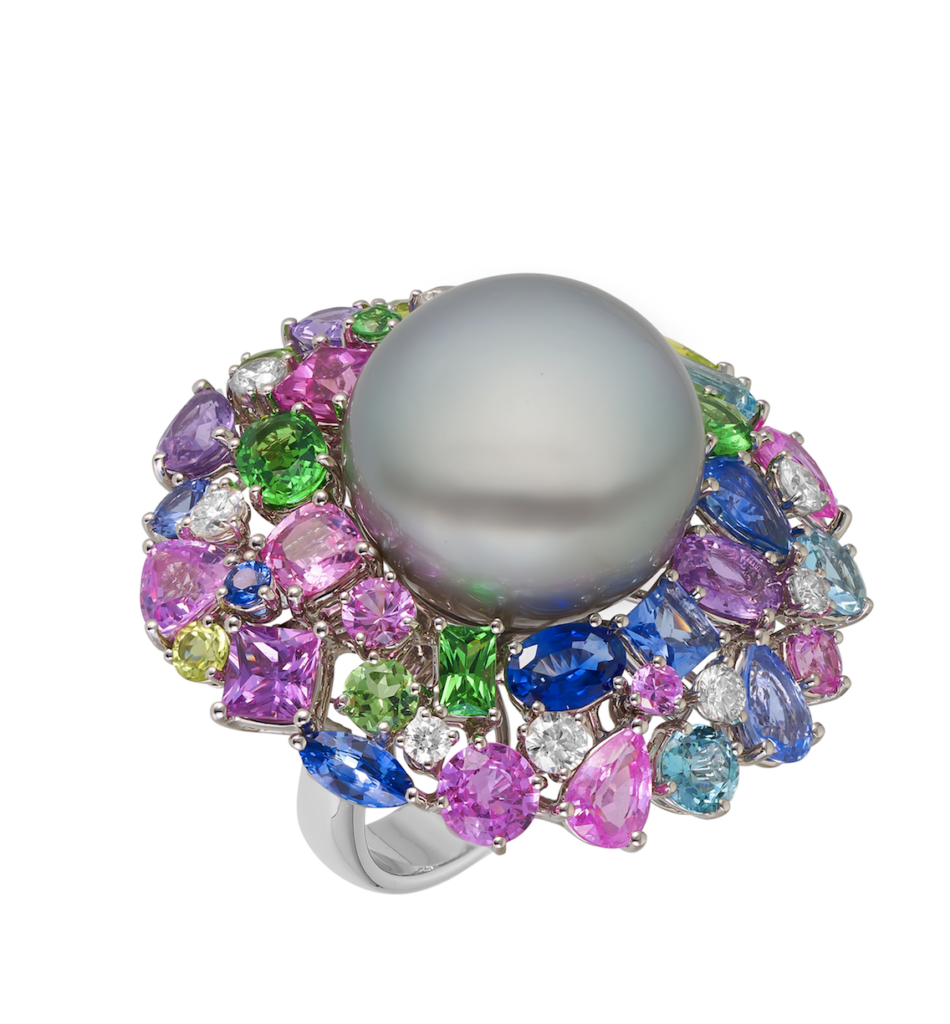 Tahitian Pearl cocktail ring surrounded by myriad of gemstones and diamonds in 18 karat white gold