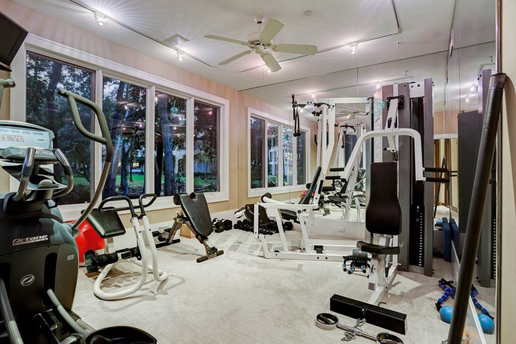 The home gym is huge with space for tons of machines. 