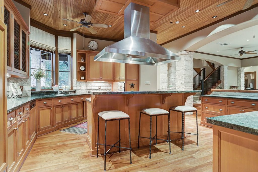 The kitchen features charming star accents and up-to-date appliances. 