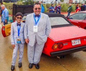 luxury car show father and son with ferrari