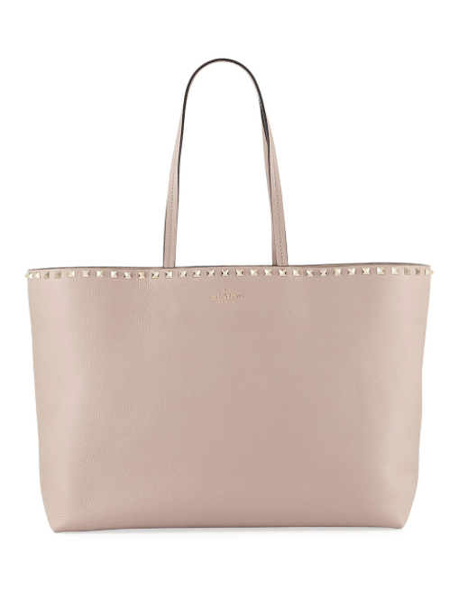 Valentino Garavani, Rockstud Vitello tote bag in beige,
$1,345, available at Neiman Marcus