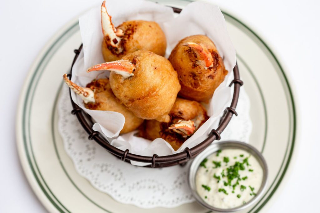 Blue crab beignets are a Gulf Coast touch. 