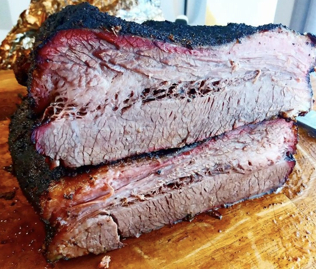 The brisket is smoked for 14 hours. 