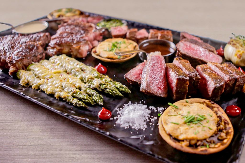 Tris boasts quite the steak board. 
