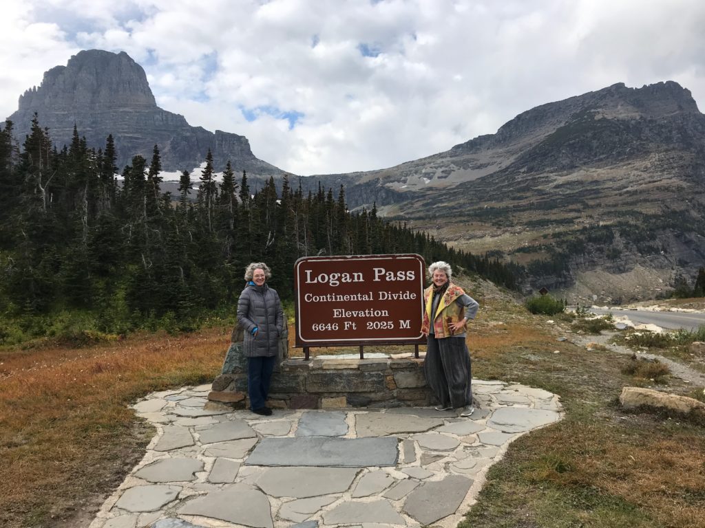 My sister Kate Maher and I pause for a photo at Logan Pass, Continental Divide.