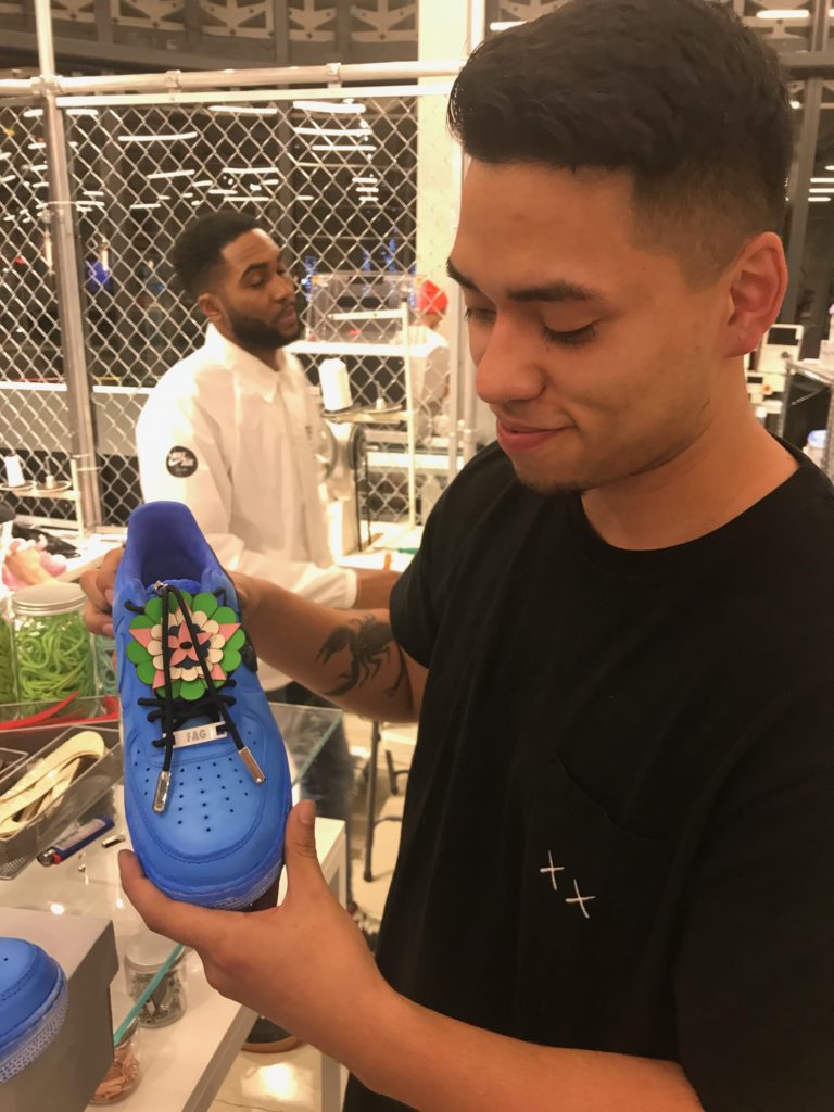 A Nike lab specialist shows off my new kicks.