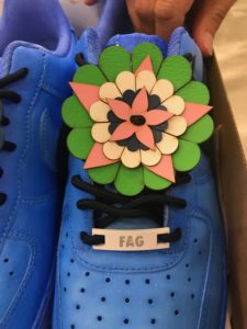 A flower and a monogram make for the perfect sneakers