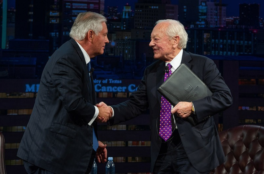 Former Secretary of State Rex Tillerson and CBS political consultant Bob Schieffer on stage at the Hilton Americas-Houston.