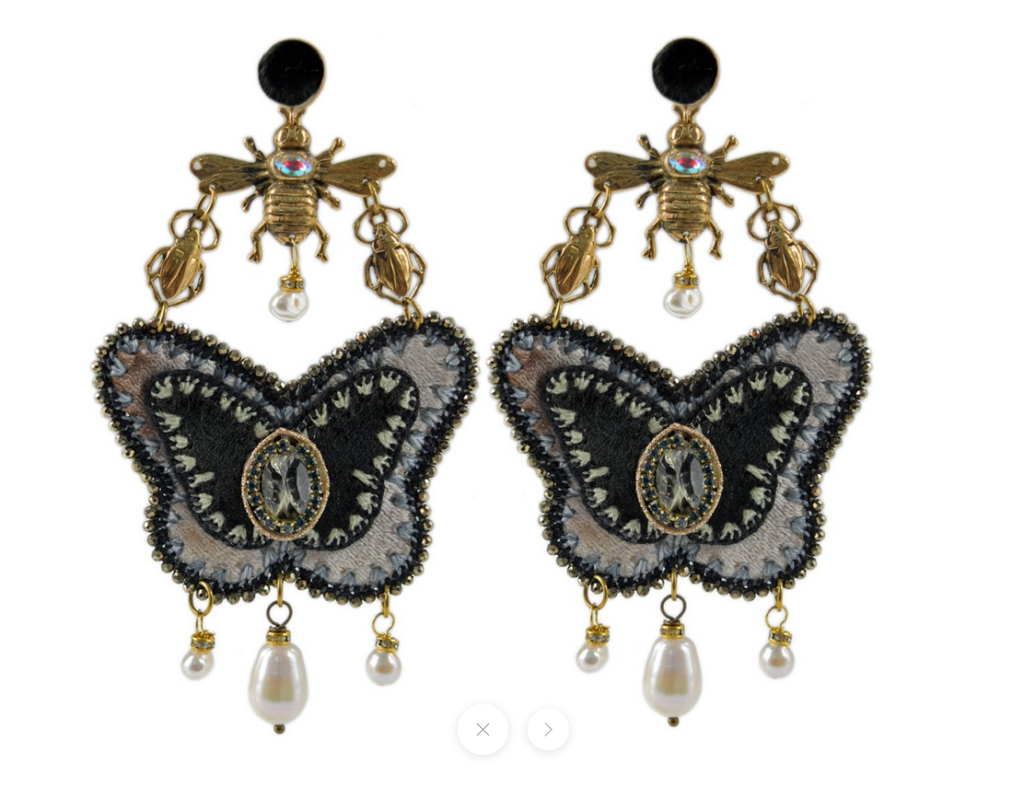 Hand-sewn and hand-crafted De Petra Mariposa Abeja Scarabajo earrings. Final shopping salon of the year at the De Petra atelier, 4408 Yoakum Blvd #2,
Houston,  
713.385.7962. $480, through De Petra. (depetra.com)