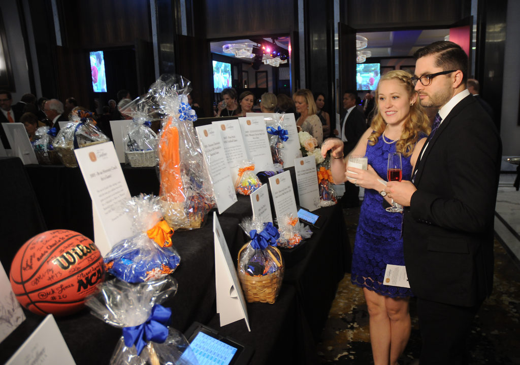 Guests view the auction items at the HBU Spirit of Excellence Gala at The Post Oak Hotel Thursday Nov. 1,2018. (Dave Rossman photo)