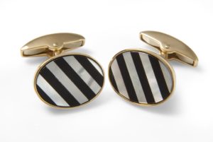 Deakin & Francis Yellow gold cufflinks with striped mother-of-pearl and onyx gemstones, $5,075