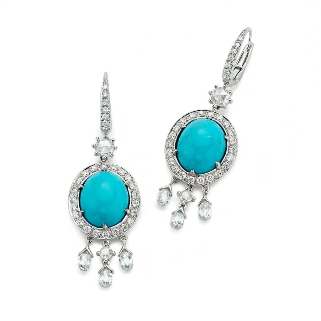 These Alupka Palace Earrings are an extravagant mixture of different architectures. Beautifully blue turquoise cabochons framed by round diamonds are given movement with rose cut diamonds that dangle in white gold. (7.21 ctw. cabochon turquoise and 2.66 ctw. diamond, $11,400)