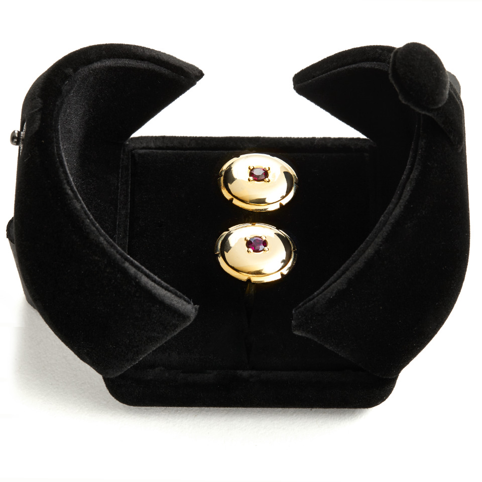 The Zars cufflinks, each set with a ruby