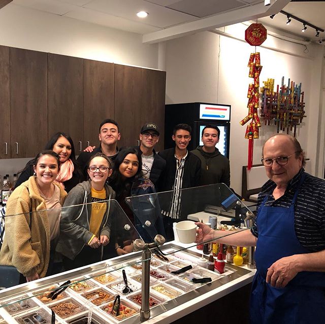 Owner of YaYa Best Tex Mex Yogurt, Ralph Isenberg, serves some late night customers. Courtesy of YaYa