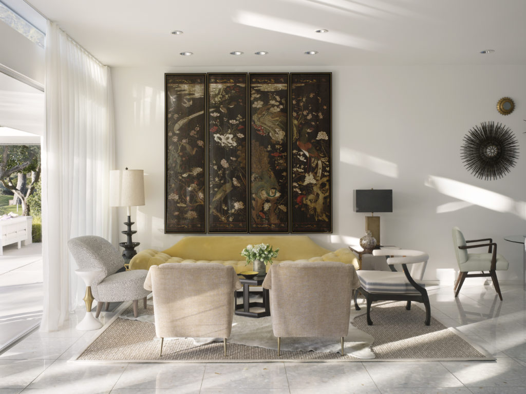 A seating area in Emily Summers’ home near Palm Springs with Qing dynasty screen and horseshoe-back chair attributed to James Mont. (Photo by Nikolas Koenig)
