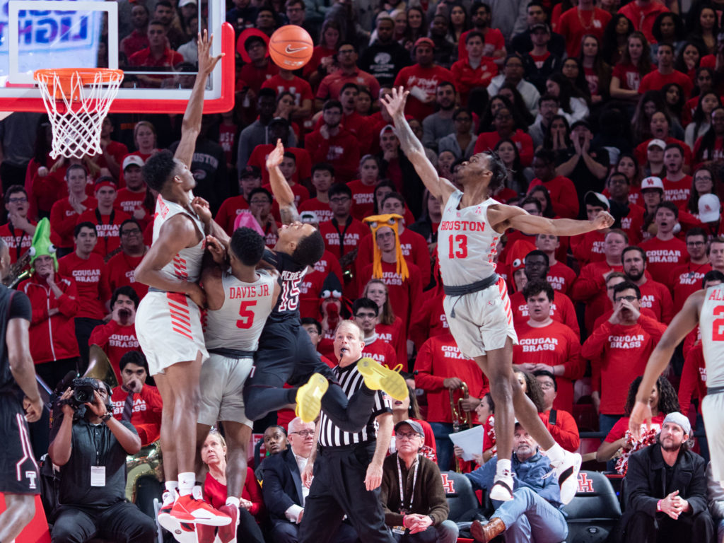 DeJon Jarreau (No. 13) gives the University of Houston extreme length and the Cougars sell out on defense. (Photo by F. Carter Smith.)