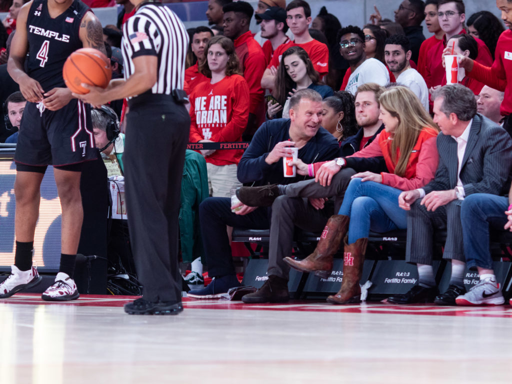 Tilman Fertitta, his son Patrick and Paige Fertitta certainly enjoyed the UH show. (Photo by F. Carter Smith.)