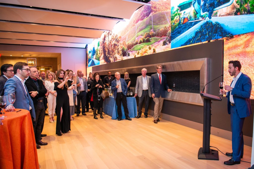 Guests of Houston Astros owner Jim Crane enjoy a preview of Balthezar Cellars, his newest project with winemaker Jesse Katz. (Photo by Michelle Watson/CatchlightGroup.com)