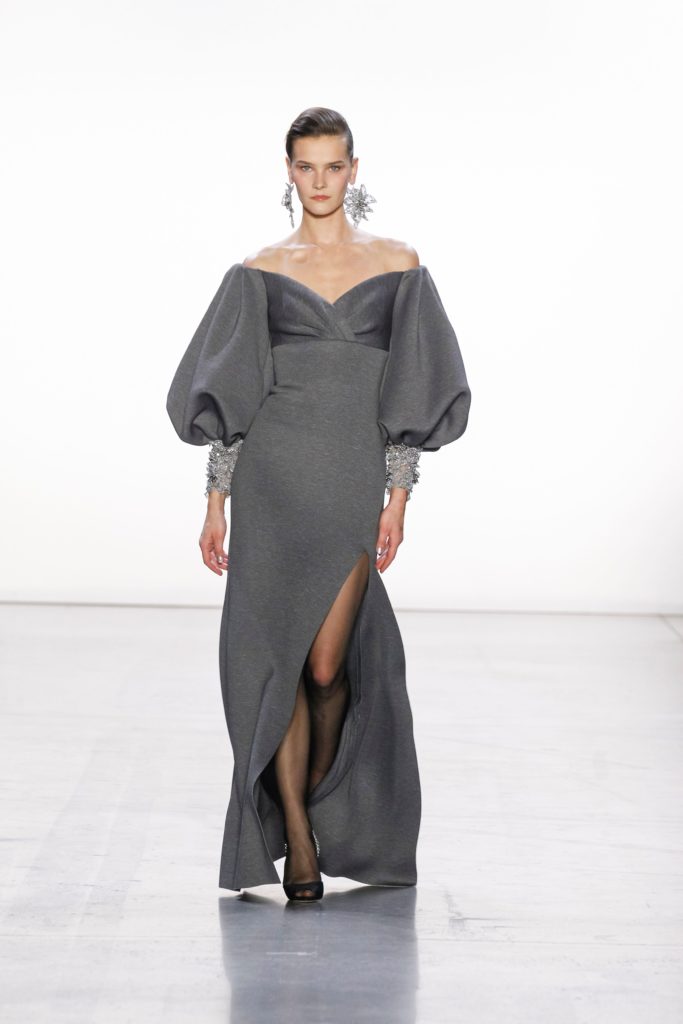 Badgley Mischka grey gown with poufy sleeves and silver trim (Photo by Badgley Mischka)