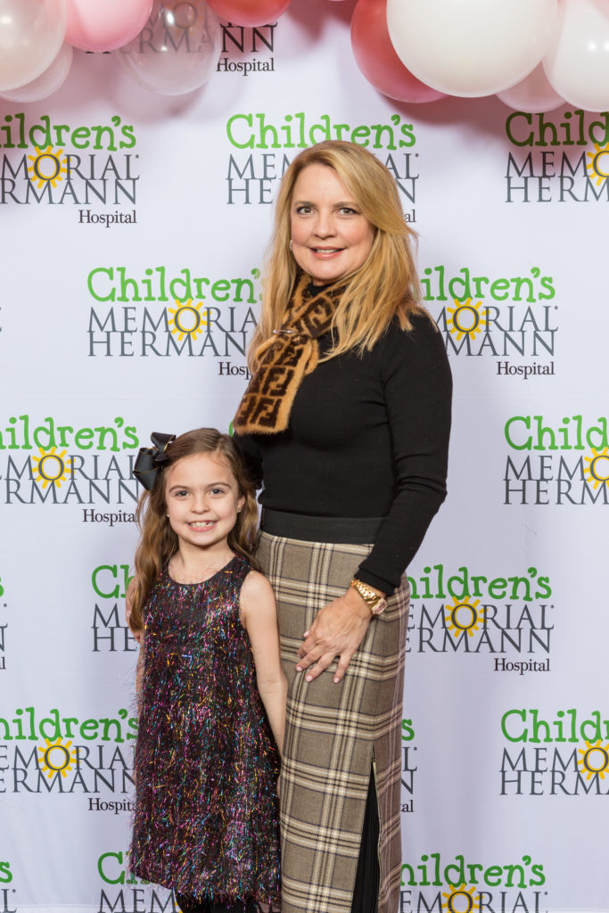2020 Best Dressed honoree Melissa Juneau and daughter Scarlette at the Children's Memorial Hermann Teddy Bear Tea at the St. Regis Hotel (Photo by Priscilla Dickson)
