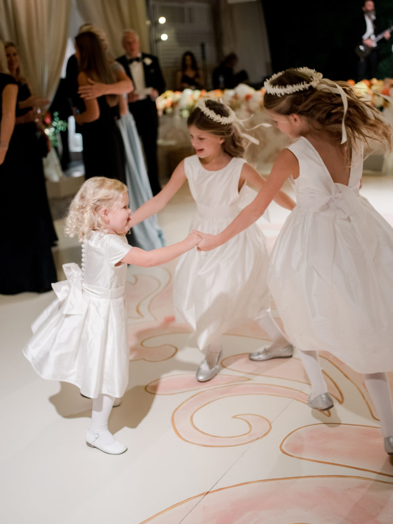 Flower girls showing off their moves on the hand painted dance floor (Photo by Liz Banfield)