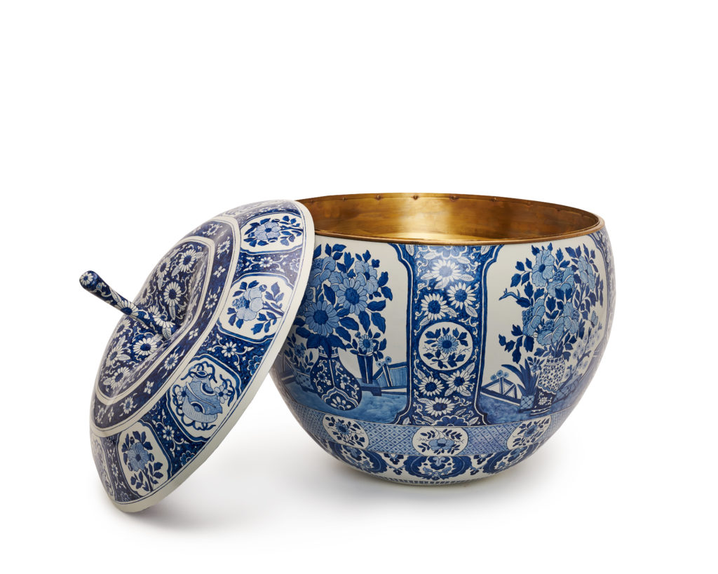 The top opens to reveal the brass inset.