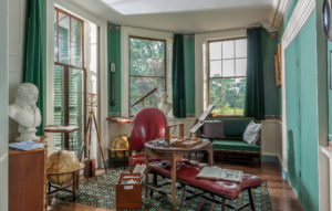 Jefferson’s Cabinet, Monticello. The current green wallpaper and coordinating floral border paper in the cabinet room — a room for reading, writing, correspondence, and scientific observation — was derived from samples found in an early 18th century grammar book at Monticello. Photo by Walter Smalling, courtesy Thomas Jefferson Foundation at Monticello.
