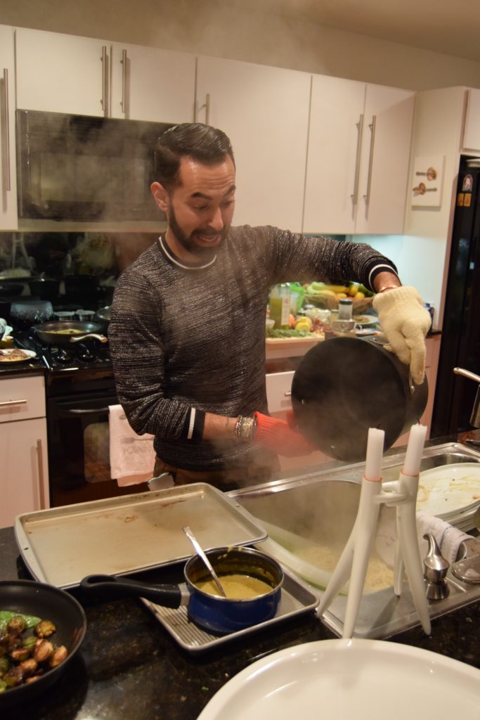 Fady Armanious pours his pasta into the sieve. (Photo by Shelby Hodge)