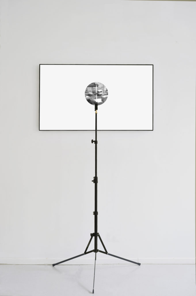 Emmanuel Van der Auwera, White Noise, 2018, Manipulated LCD screen, video, tripod with plexiglass 
