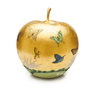Gracie wallpaper applied 24K gold leaf before delicately hand-painting a scene of butterflies.
