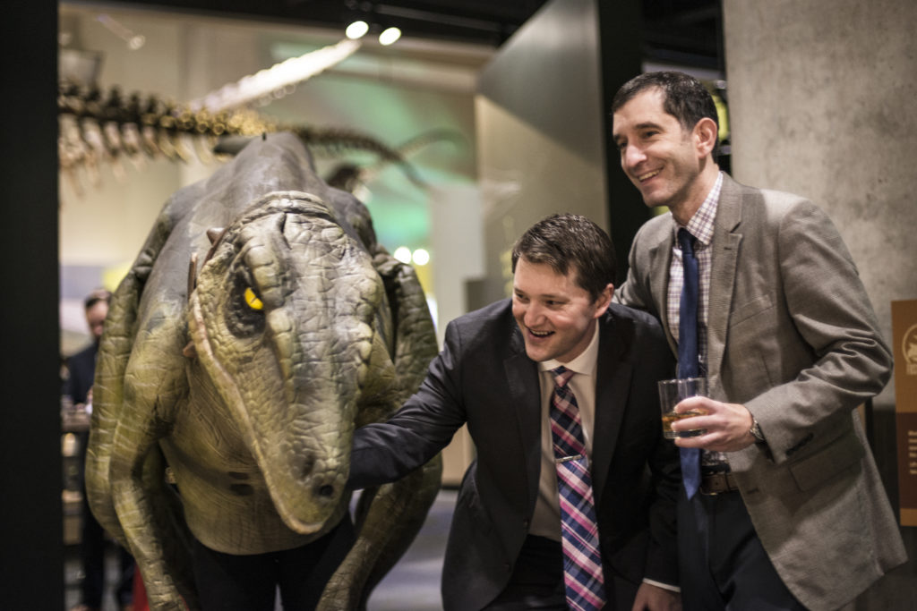 Guests chatting with Roxy the raptor (Photo by Turk Studio)