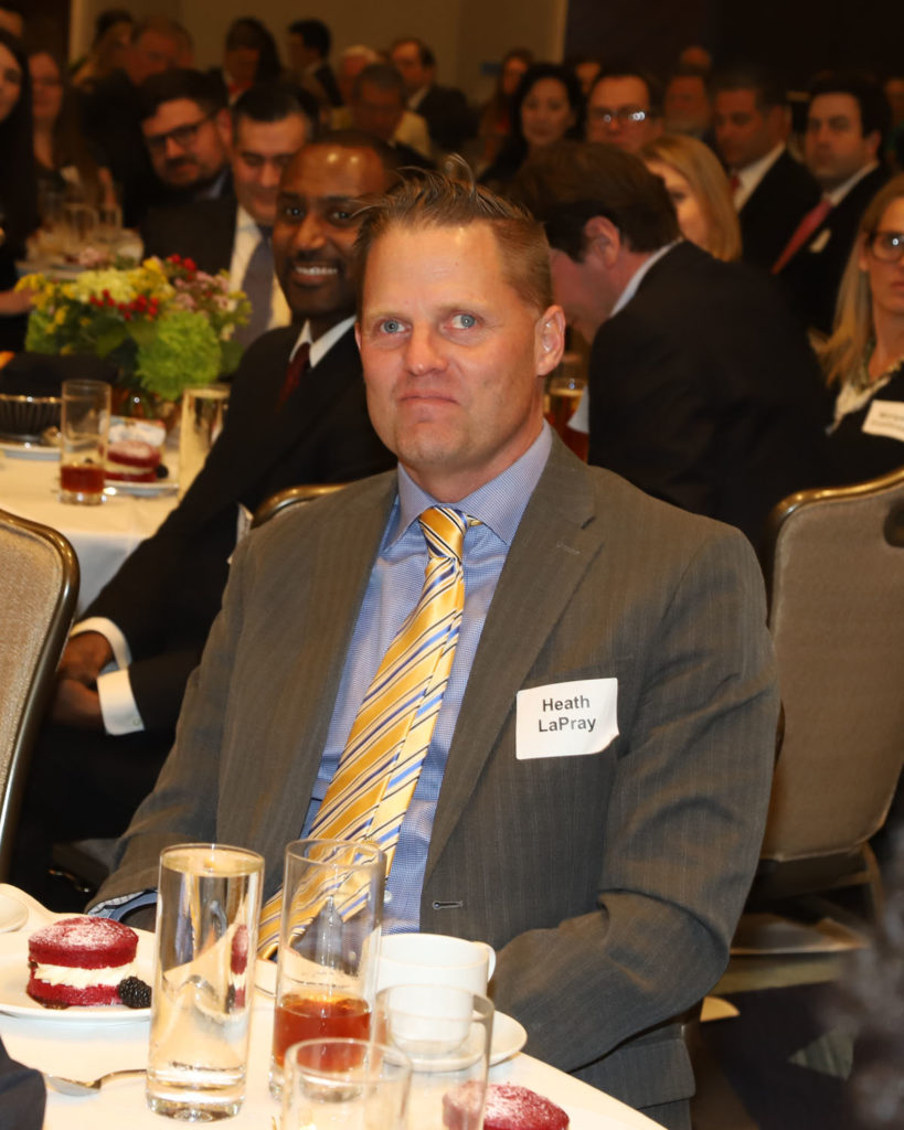 Heath LaPray photobombed by Michael Thomas  at the Houston Bar Foundation luncheon. (Photo by Debi Wallace, Barfield Photography)