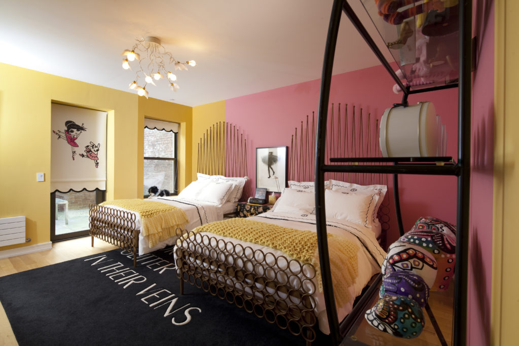 The Loyas' two daughters share a bedroom in the 4,000 square foot dwelling. (Photo by Julie Soefer)