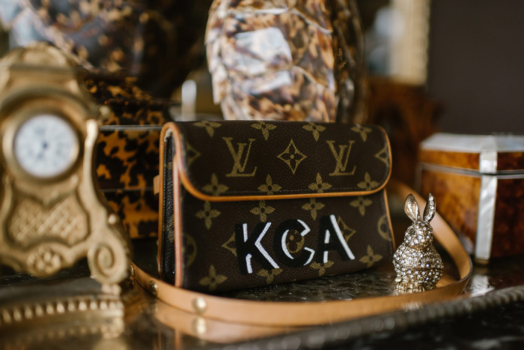 The creator's personal monogram makes for a glorious purse. 