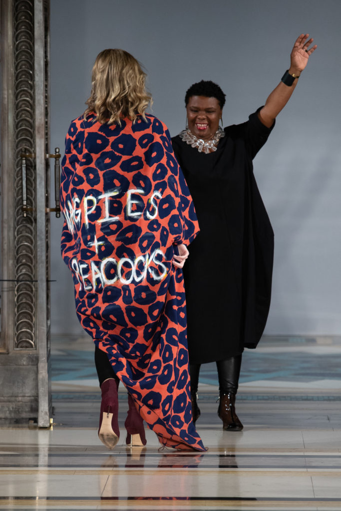 Magpies & Peacocks' Ahshia Berry strikes a pose with recording artist Elle L, the official UK ambassador to M&P, at London Fashion Week 2019. (Photo by Simon Armstrong)