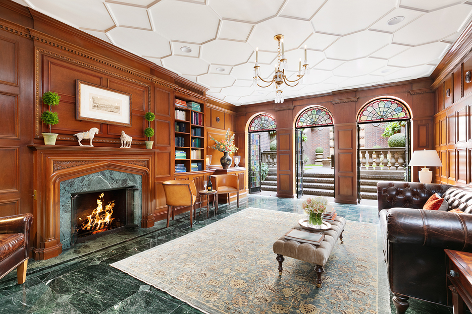 The living area boasts a restored Victorian ceiling with ornamental tracery and shares the ground floor with a fully-equipped kitchen and powder room. (Photo by Brynne Levy Photography) (Photo by Will Ellis/ DDReps )