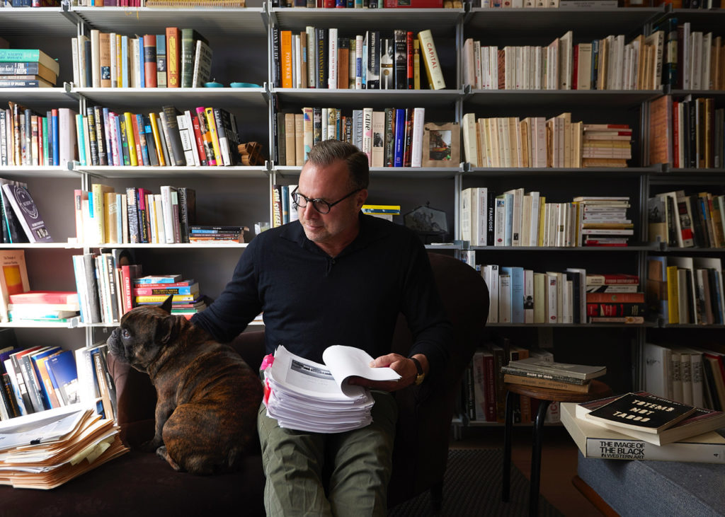 William Middleton in his New York apartment, reviewing the "Double Vision" manuscript. (Photo by William Jess Laird)