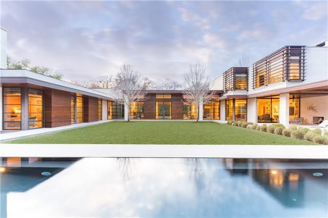 The carefully manicured backyard is unbelievable. 