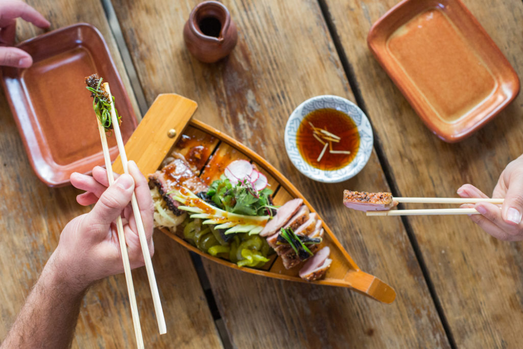 The BBQ Boat at Kemuri Tatsu-Ya is a festive take on Asian bbq. (Photo by Kirsten Kaiser)