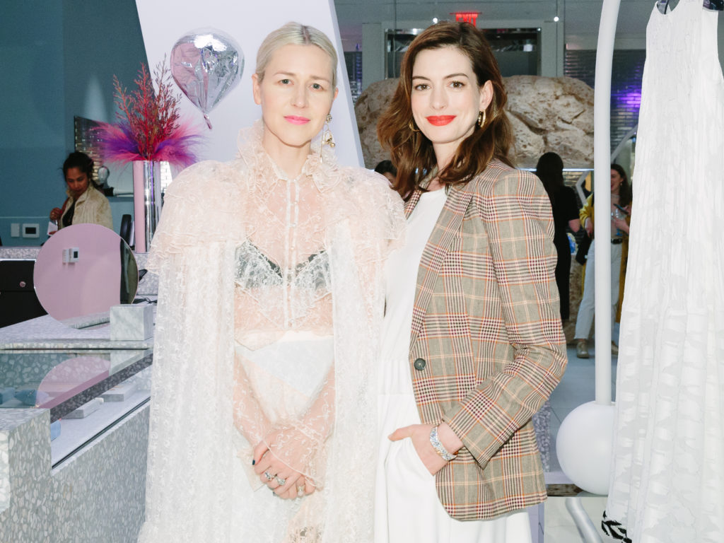 Kristen Cole, Anne Hathaway at the Forty Five Ten opening in Manhattan's Hudson Yards. (Photo by Yvonne Tnt/BFA.com)