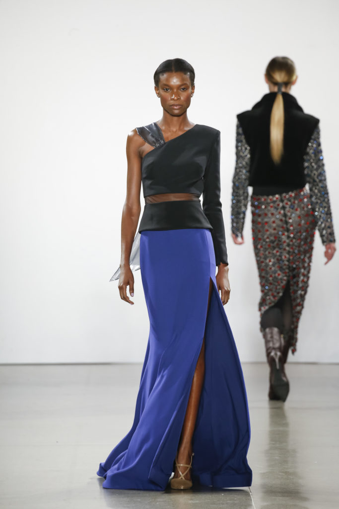 Burnett black asymmetrical cut-out one-sleeve top and indigo high slit skirt (Photo by Burnett New York)