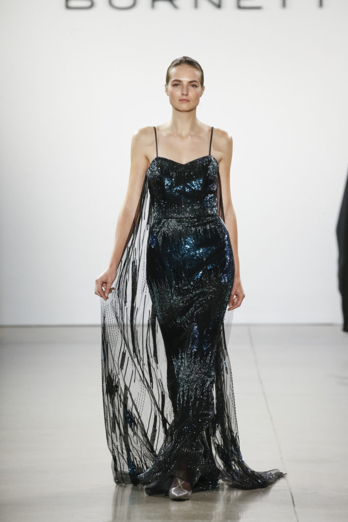 Burnett black and teal sequin gown with cape detail (Photo by Burnett New York)