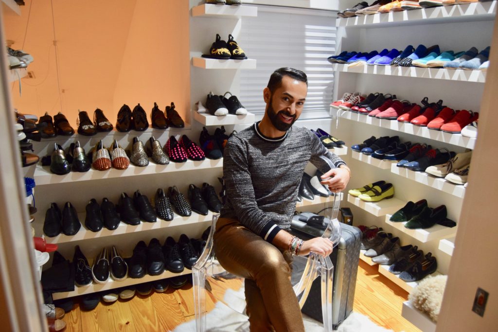 Fady Armanious proudly displays the consequences of his shoe fetish. (Photo by Shelby Hodge)