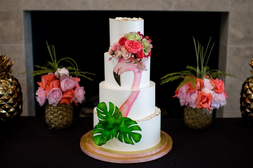 Whitney Crane's birthday cake follows the flamingo theme of her party in Palm Beach, Florida. (Photo by Oona Beyer, Dragonfly Photography)