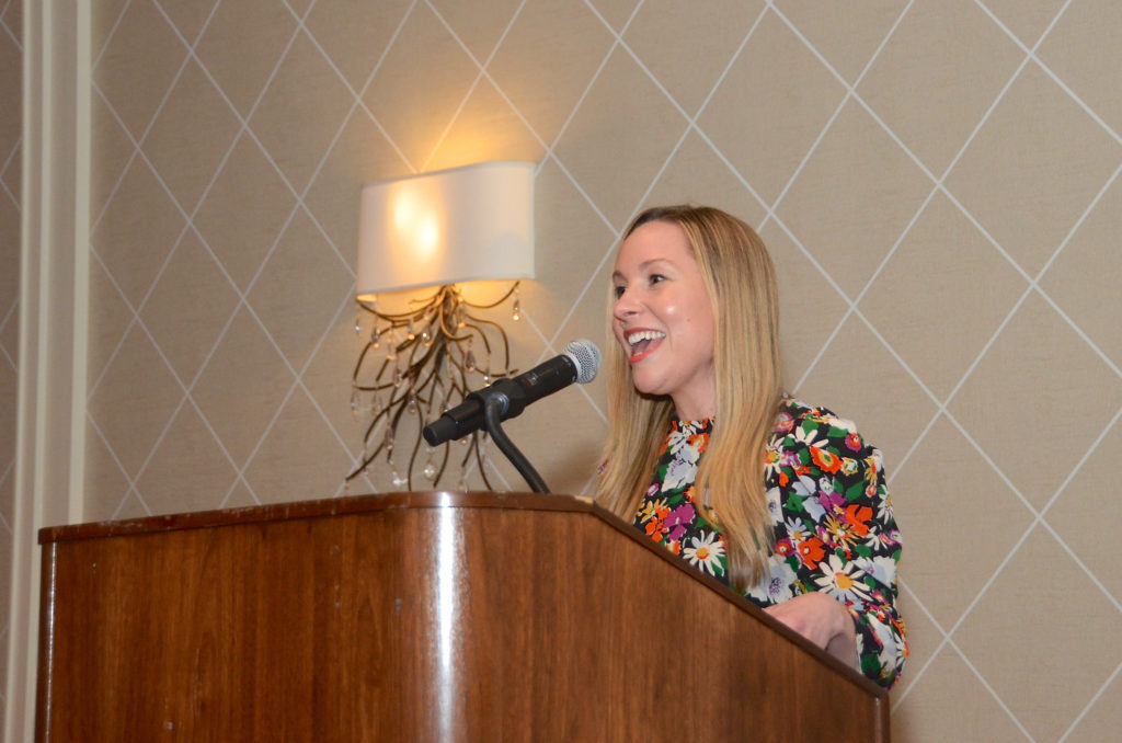 Auctioneer Sarah Krueger at Houston Center for Photography 2019 Print Auction. (Photo by Roswitha Vogler)