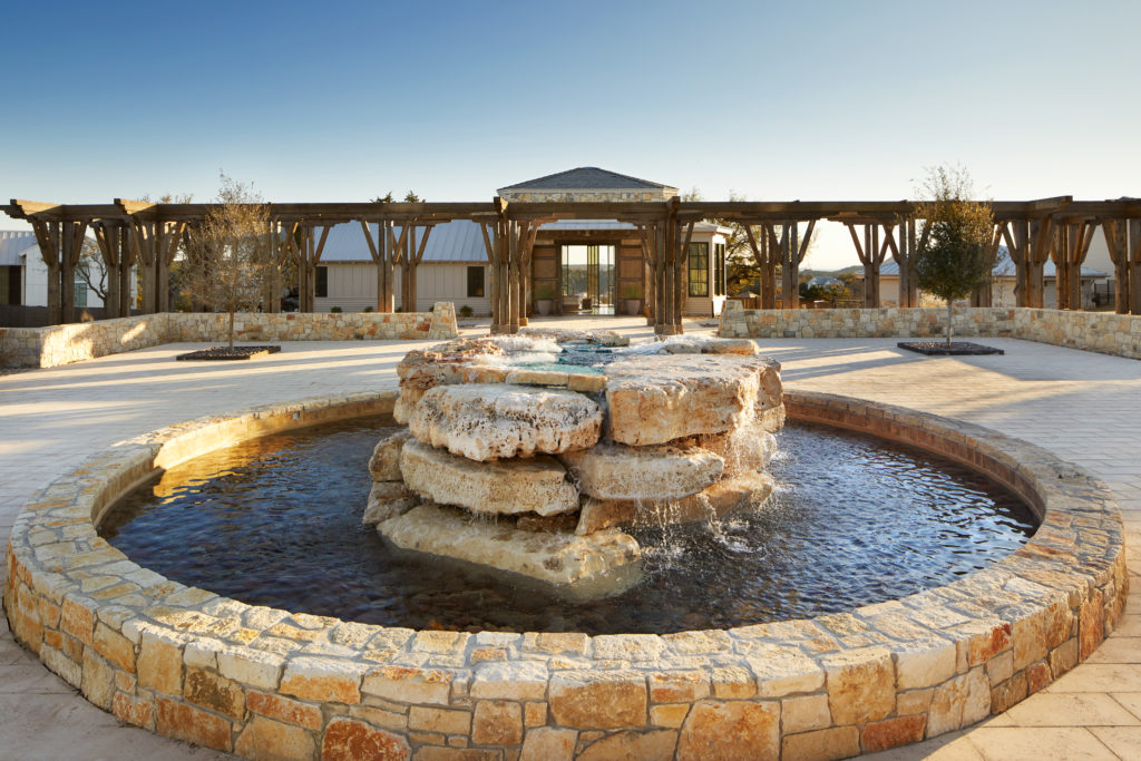 A rock sculpture welcomes to the Miraval Spa arrival center. (Photo by James Baigrie for Miraval Austin)