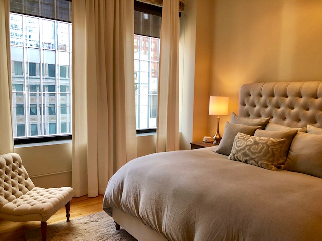 Downtown views from the bedroom add appeal to this dwelling in the St. Germain. (Photo by Jackie Traywick)